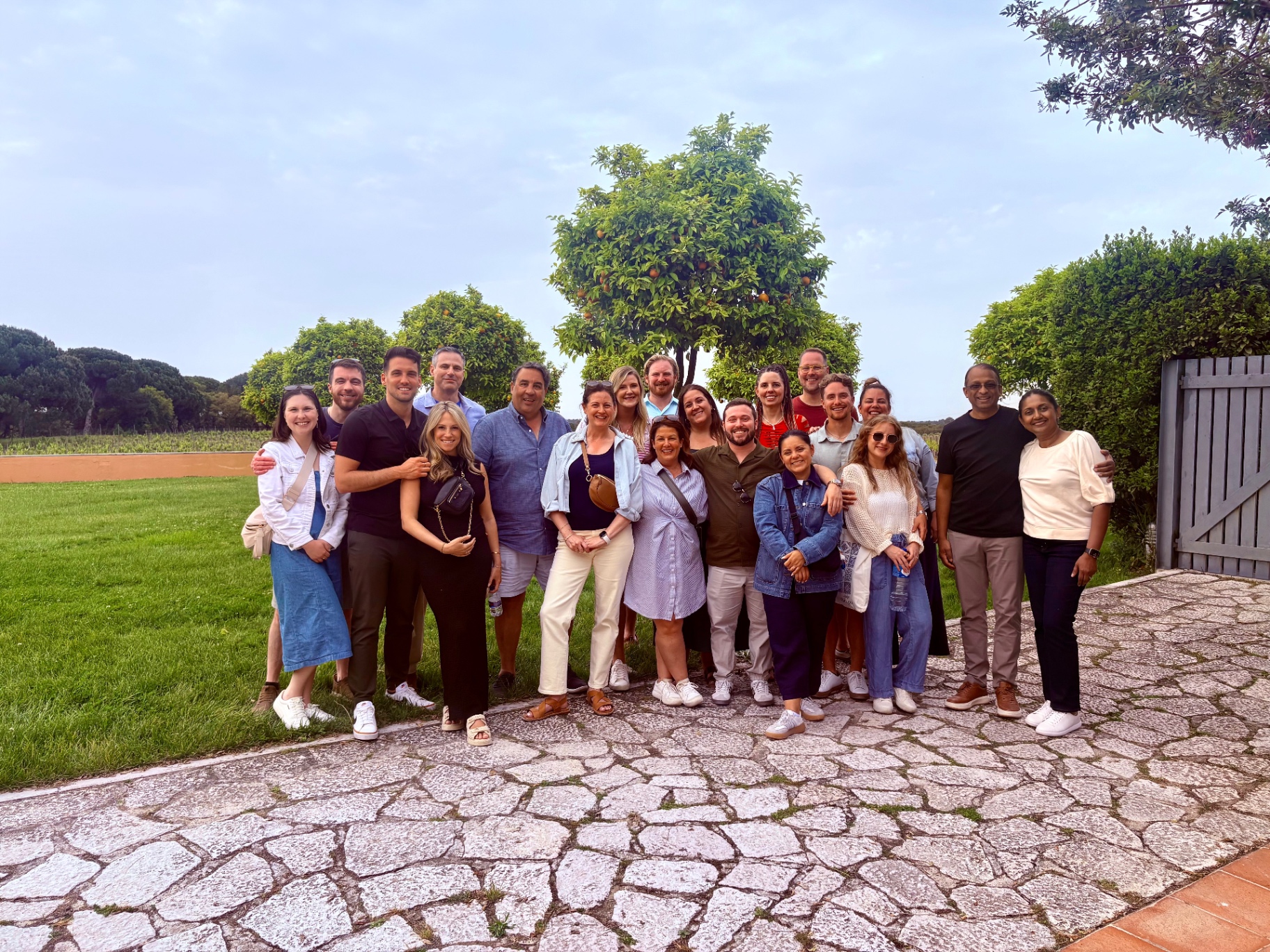 A private group at a quinta courtyard with orange trees near Comporta